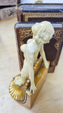 Pair of Art Deco Style Bookends in the Form of Two Nudes Standing on Shells (24cm high, Cast Resin)